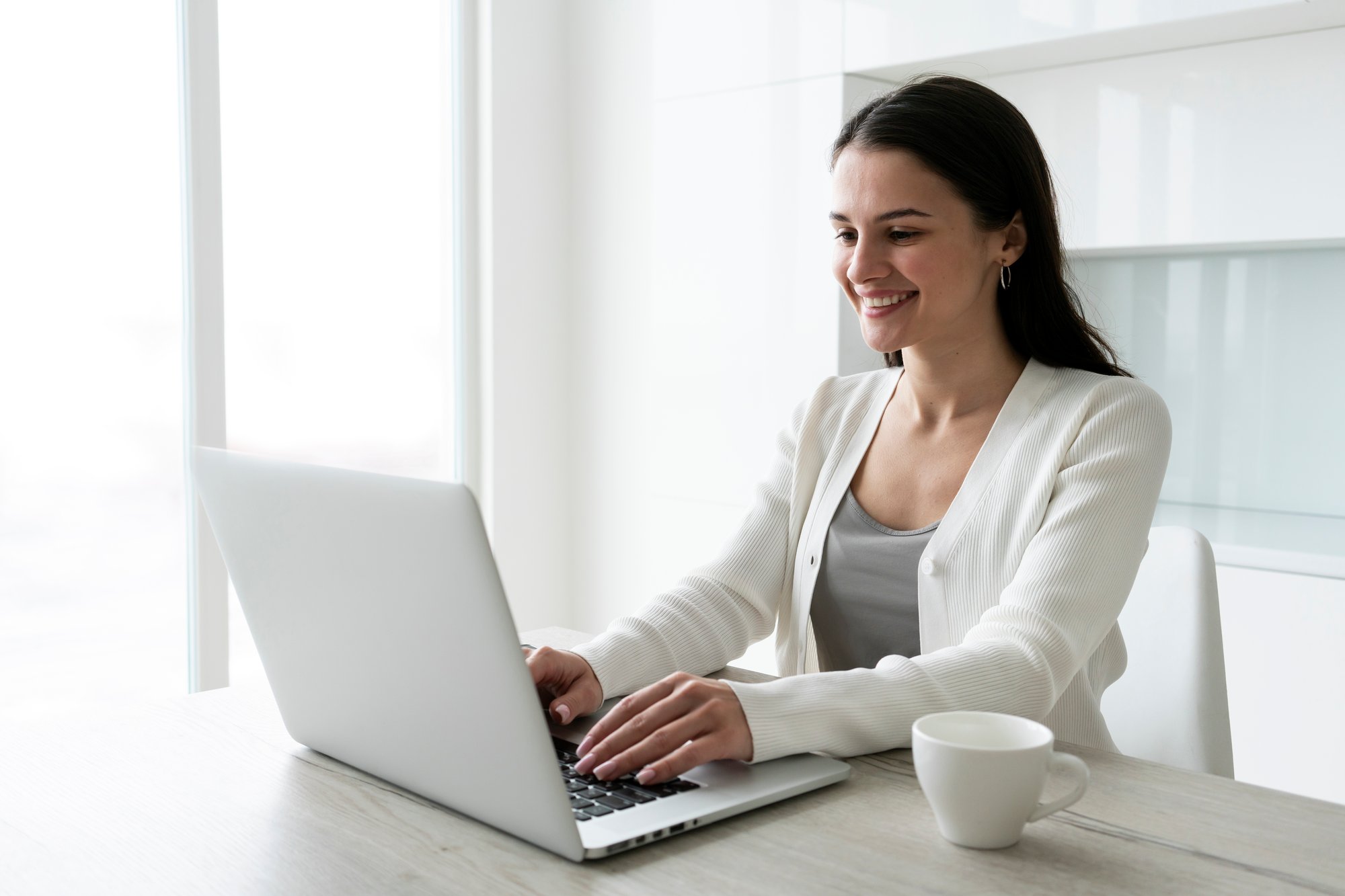 medium-shot-woman-working-laptop